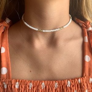 White and gold beaded necklace